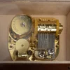 Another Close-up of gold-plated 18-note musical movement inside Ercolano "London's Autumnal Dream" music box – precision Swiss-style mechanism