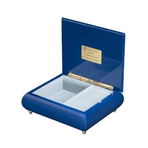 A MoonLight Serenade music box open – velvet interior, gold hinge, branded plate, wind-up musical movement jewelry box